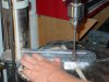 truing up the finger hole at the drill press